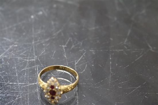 An early-mid 20th century 18ct gold, ruby and diamond marquise cluster ring, size M.